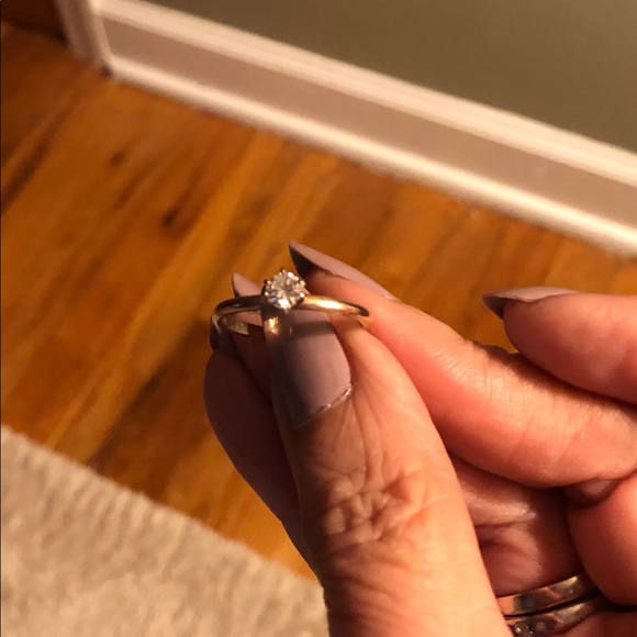 1/4 diamond solitaire in 14K gold.
